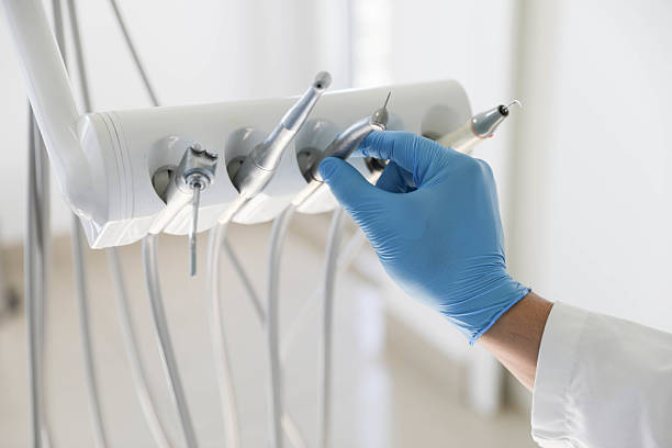 Professional Tooth Extraction technician working in Boston, MA